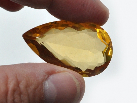 Citrine, faceted in drops, approx. 65 carats