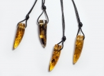 BALTIC amber pendant amulet on leather strap "wolf tusk"